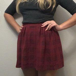 Burgundy and black plaid skirt. Size extra small.